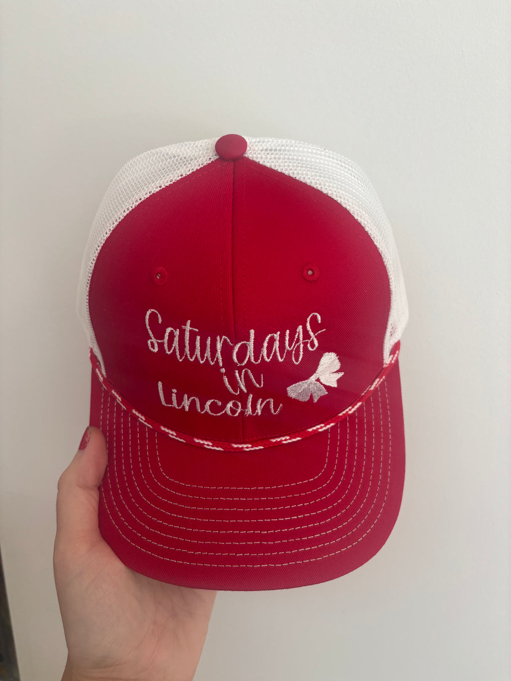 Saturdays in Lincoln Trucker Hat